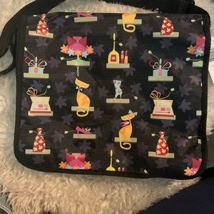 Black satchel with kitty/shopping design